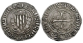 Monedas. Se observa el anverso y reverso de una moneda de la época de Jaume III del reino de Mallorca.